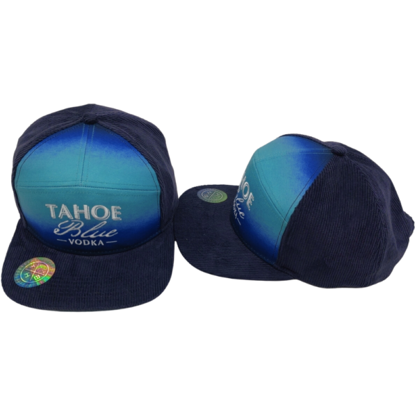 Tahoe Blue Vodka white logo embroidered on blue corduroy adjustable snapback hat. 